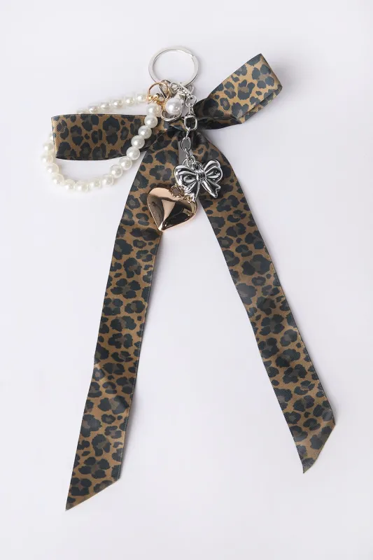 Bow With Pearls And Metal Heart Bag Charm sold by Bluenotes