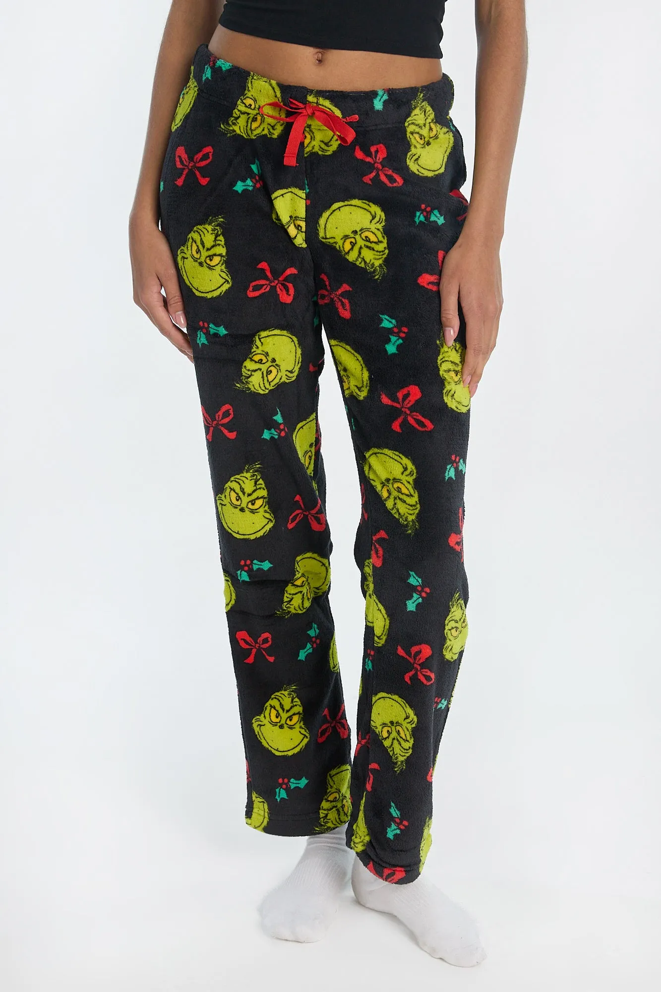 The Grinch Bow Plush Pajama Pants sold by Bluenotes