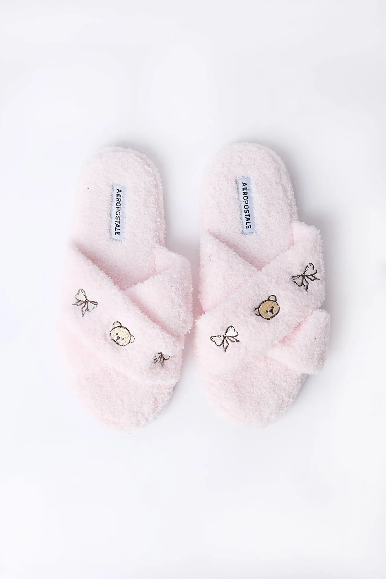 Embroidered Boucle Crossover Plush Slippers sold by Bluenotes