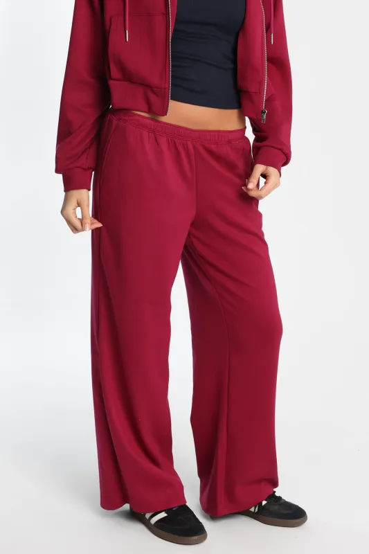 Tech Fleece Wide Leg Sweatpants sold by Bluenotes