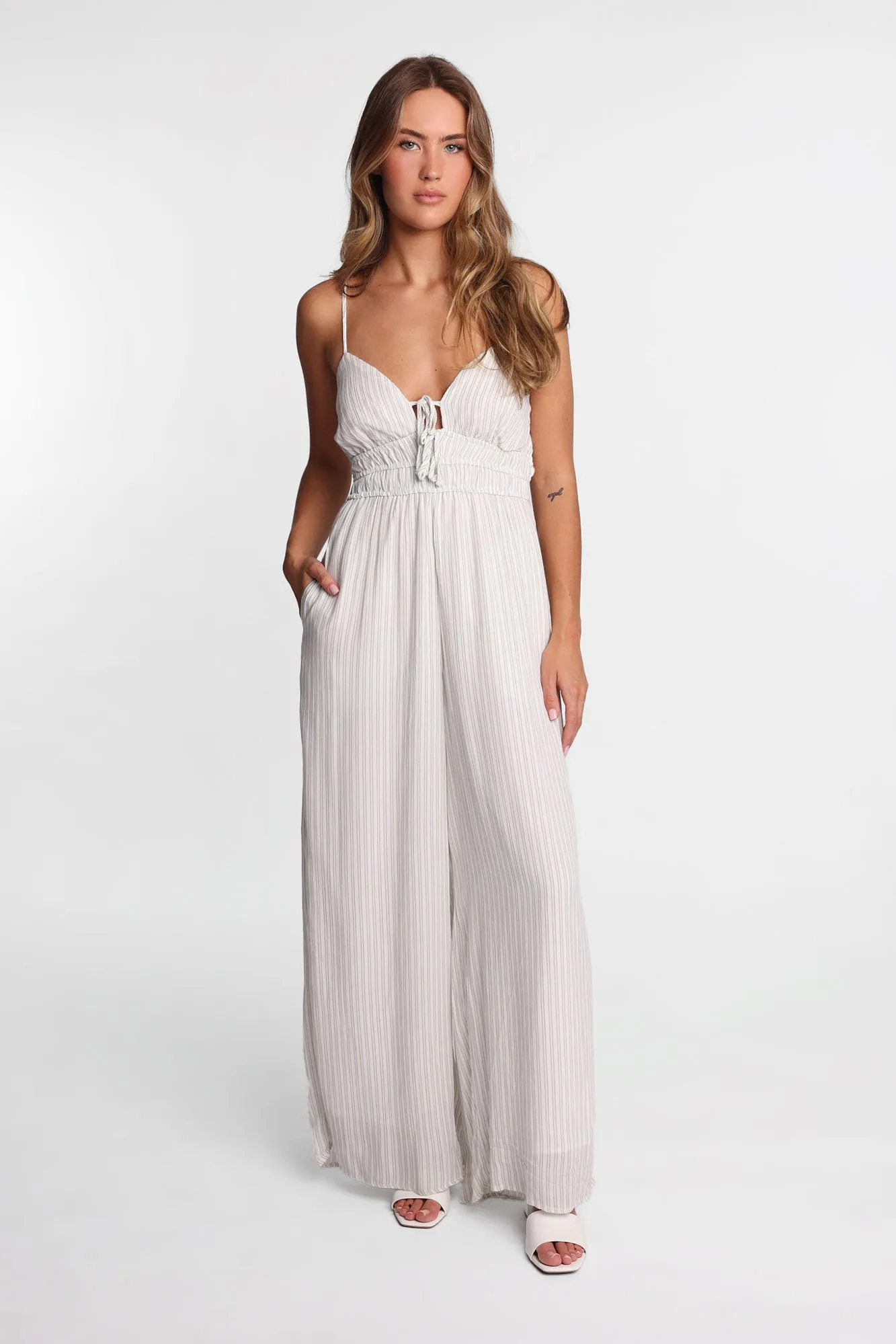 AERO Gauzy Tie-Front Wide Leg Jumpsuit sold by Bluenotes
