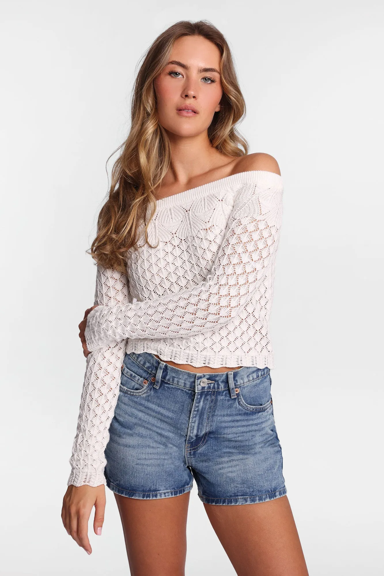 Crochet-Style Long Sleeve Off-Shoulder Top sold by Bluenotes