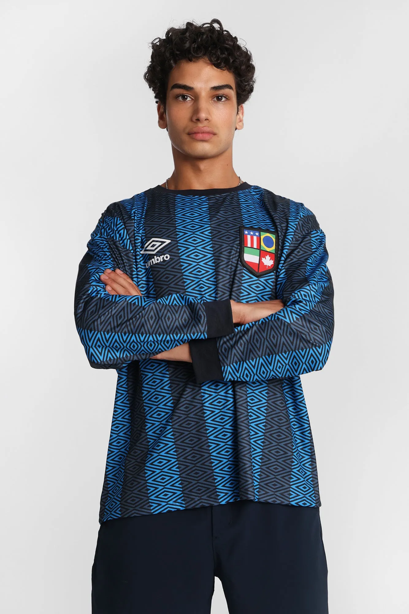 Umbro The World's Game Graphic Long Sleeve Crew Neck Jersey sold by Bluenotes