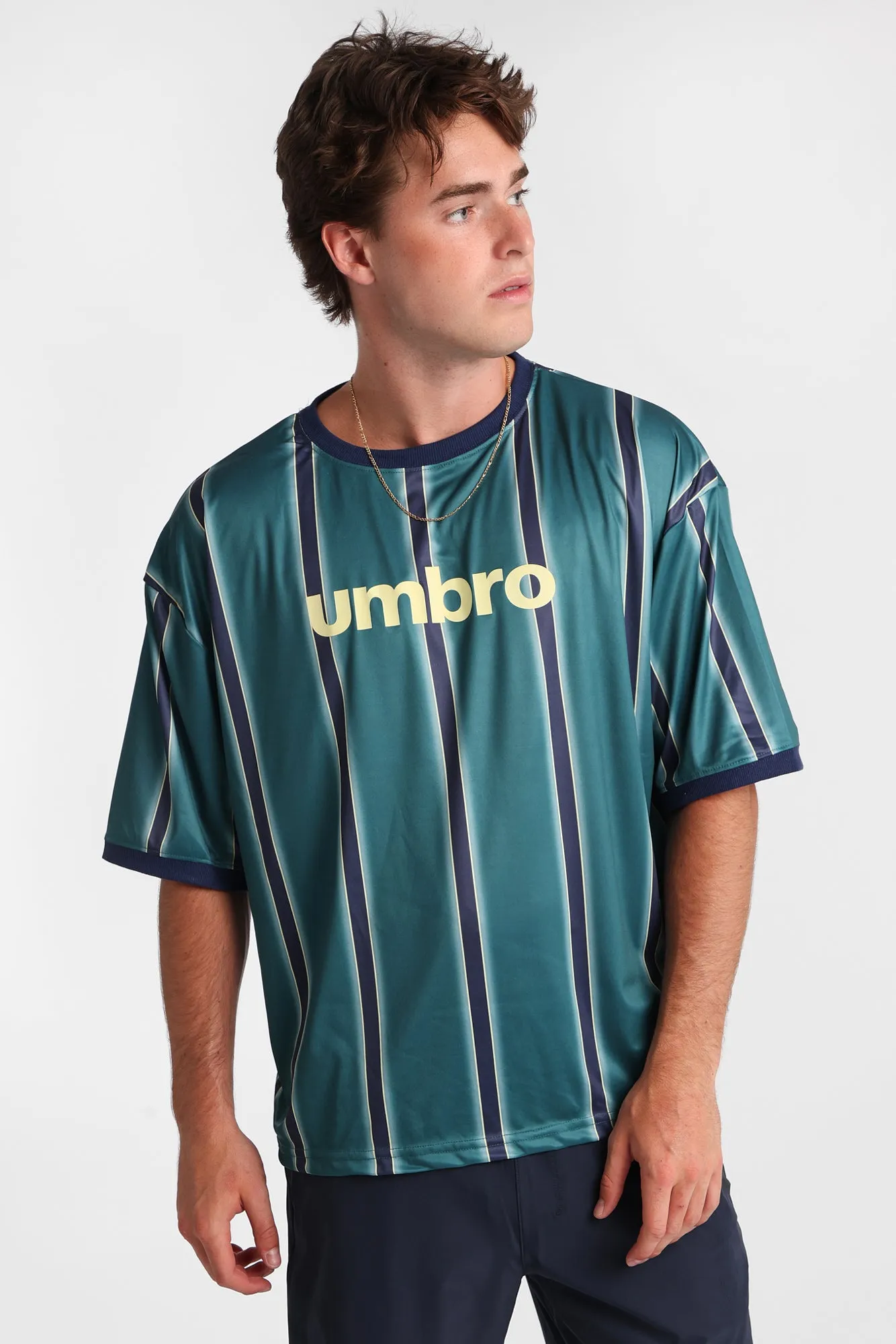 Umbro Large Logo Striped Tee sold by Bluenotes