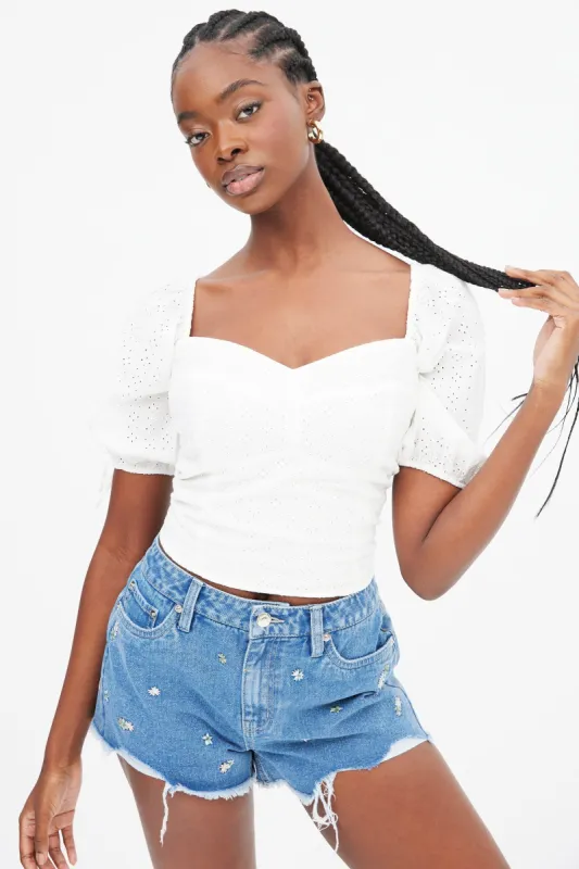 Embroidered Puff Sleeve Corset Top sold by Bluenotes