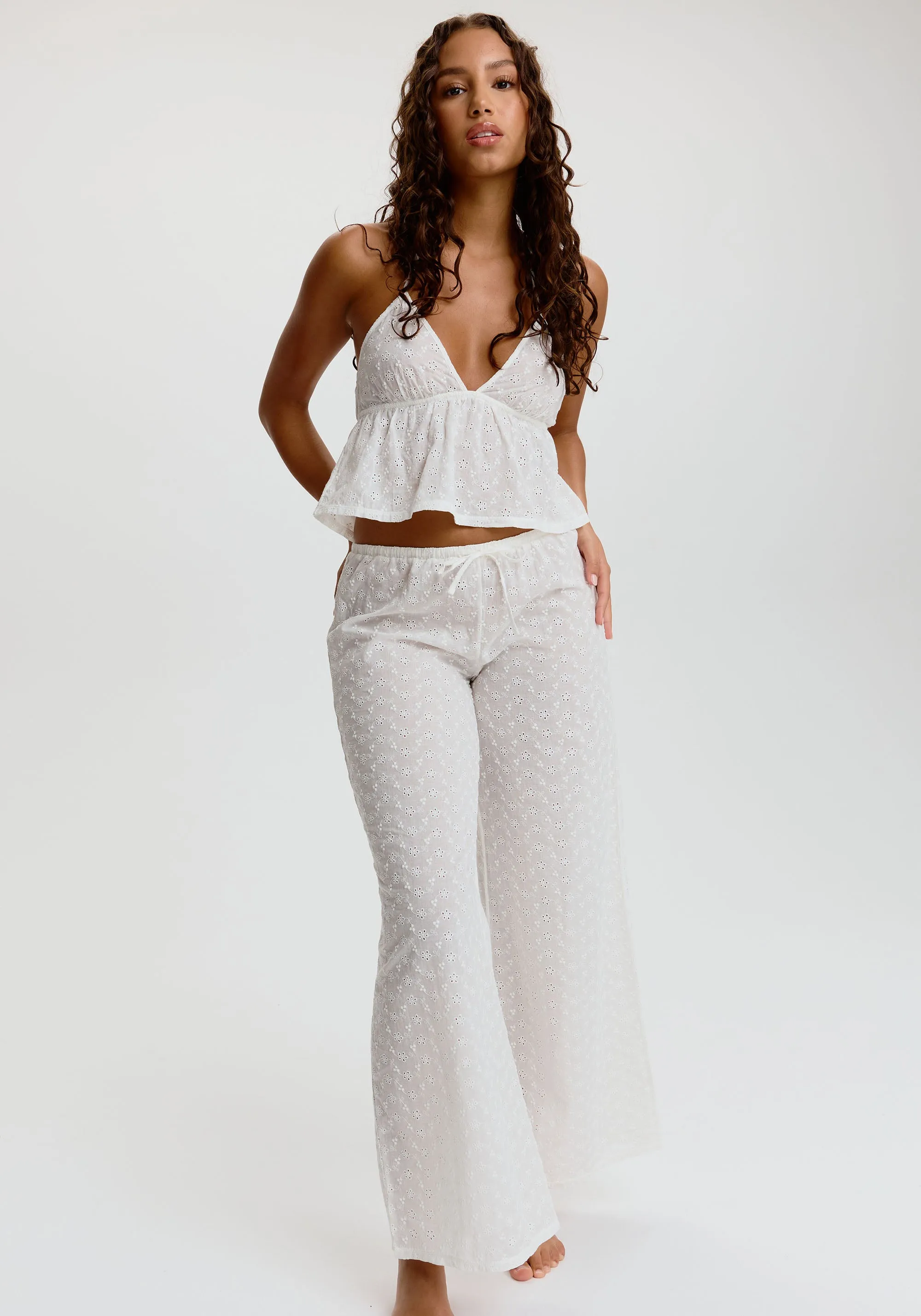 wander embroidered eyelet pant sold by Blush