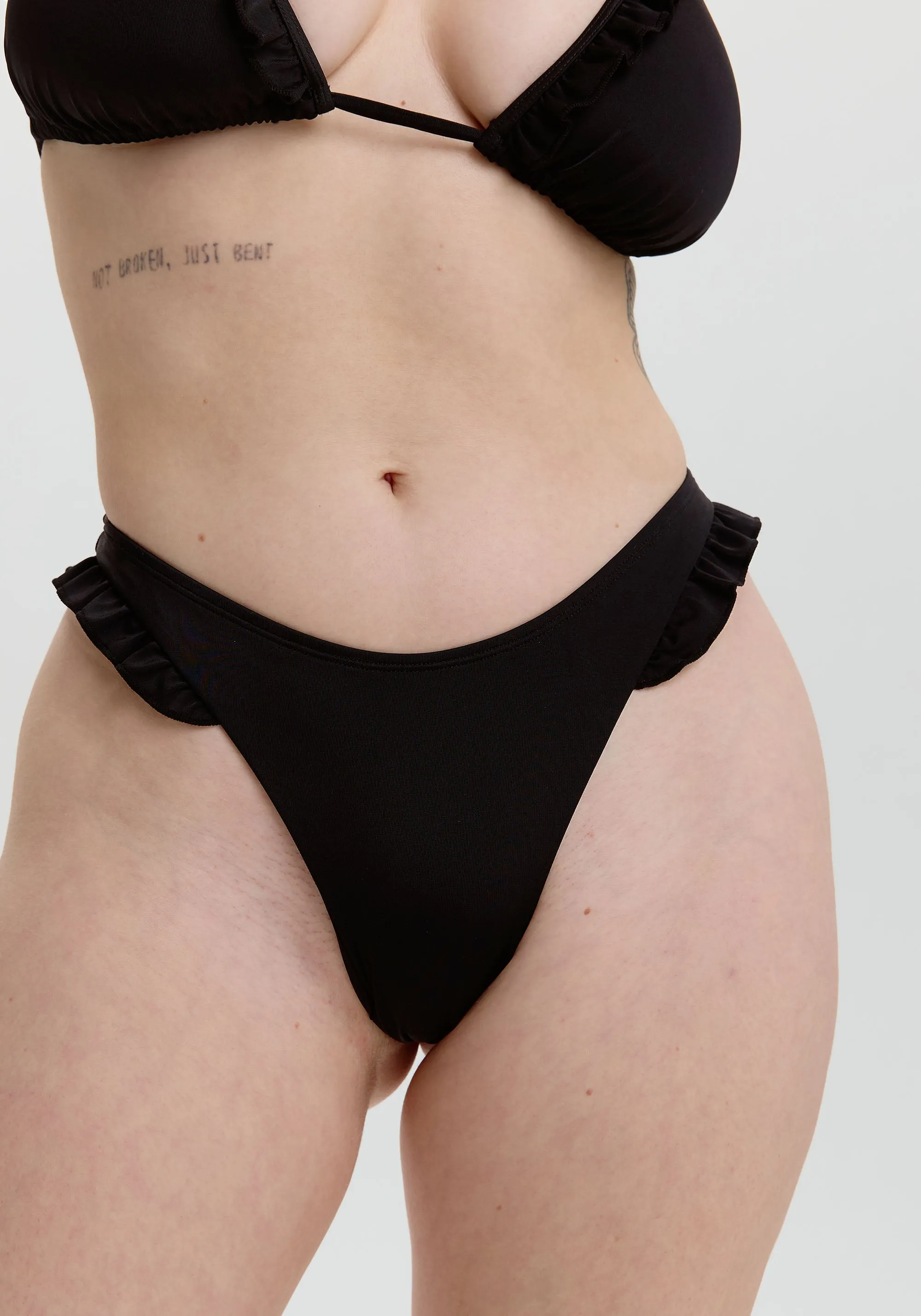 cora ruffle thong bikini bottom sold by Blush