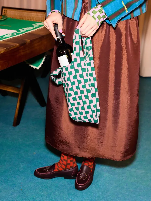 Chain all over bottle cover sold by Bobo Choses