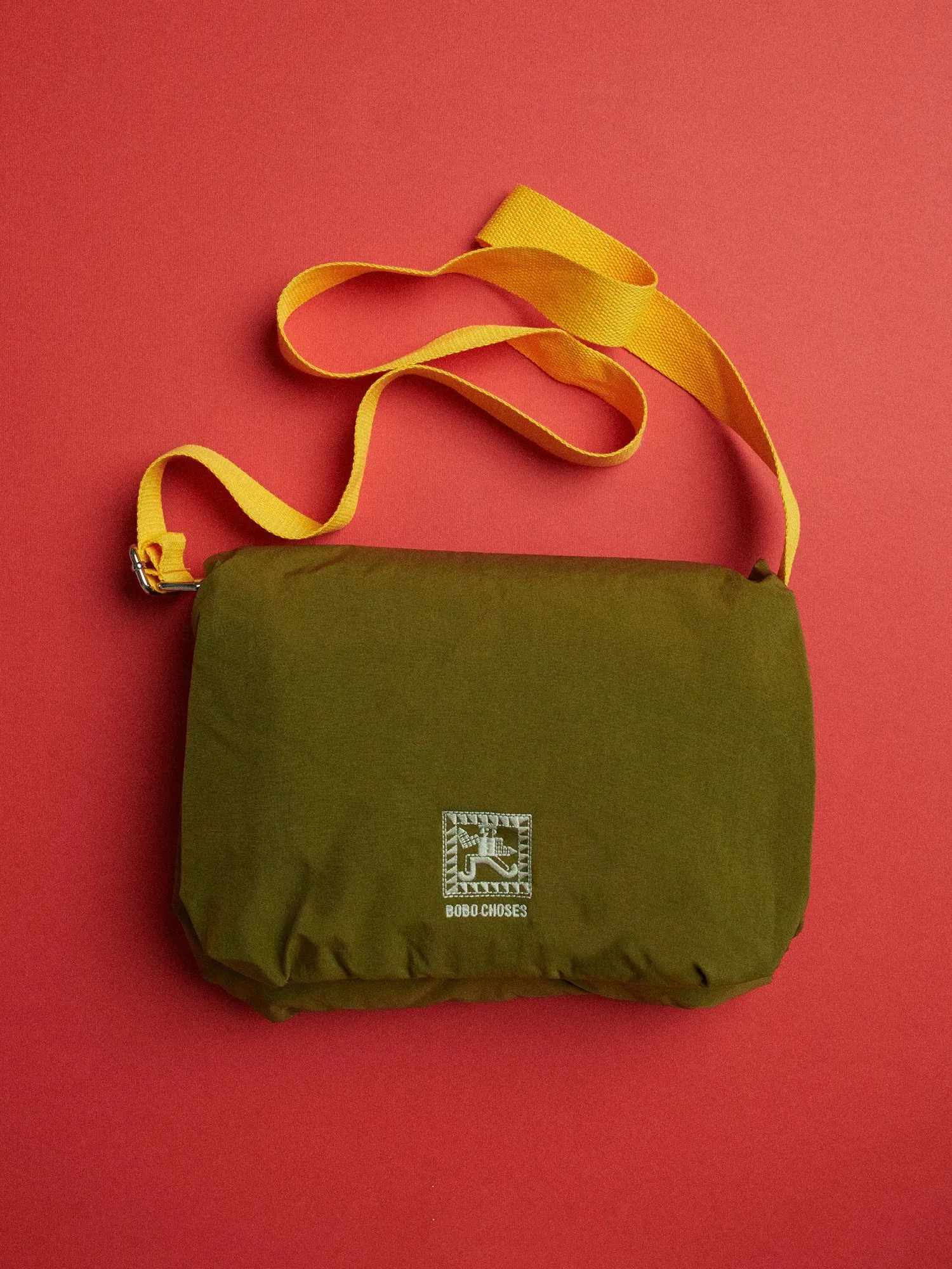 Padded crossbody bag sold by Bobo Choses