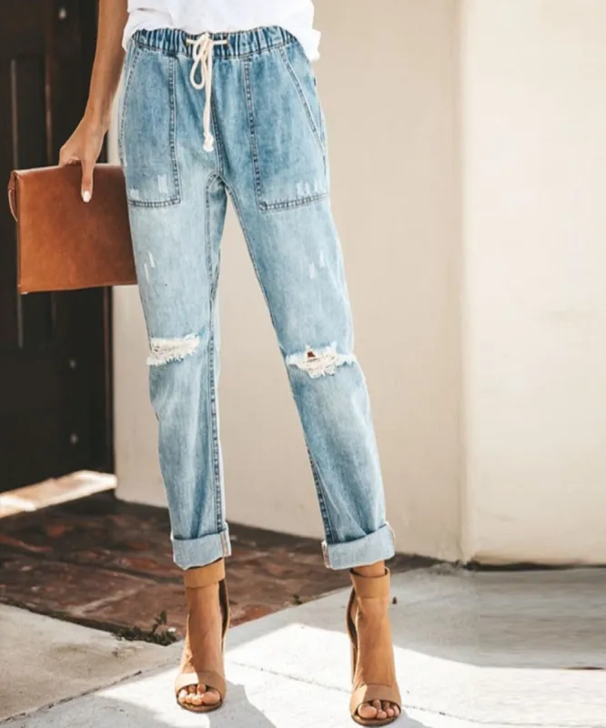 Mid Waist Boyfriend Jeans sold by Body Central
