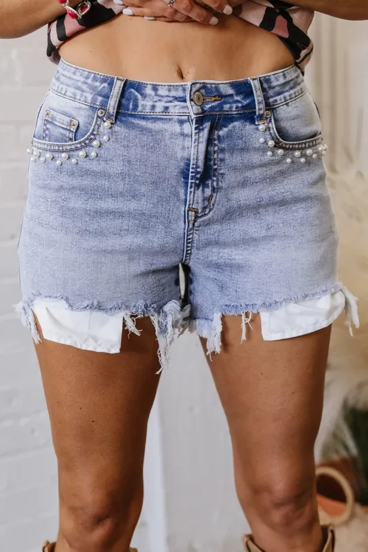 Pearl Studded Pockets Raw Hem Denim Shorts sold by Body Central