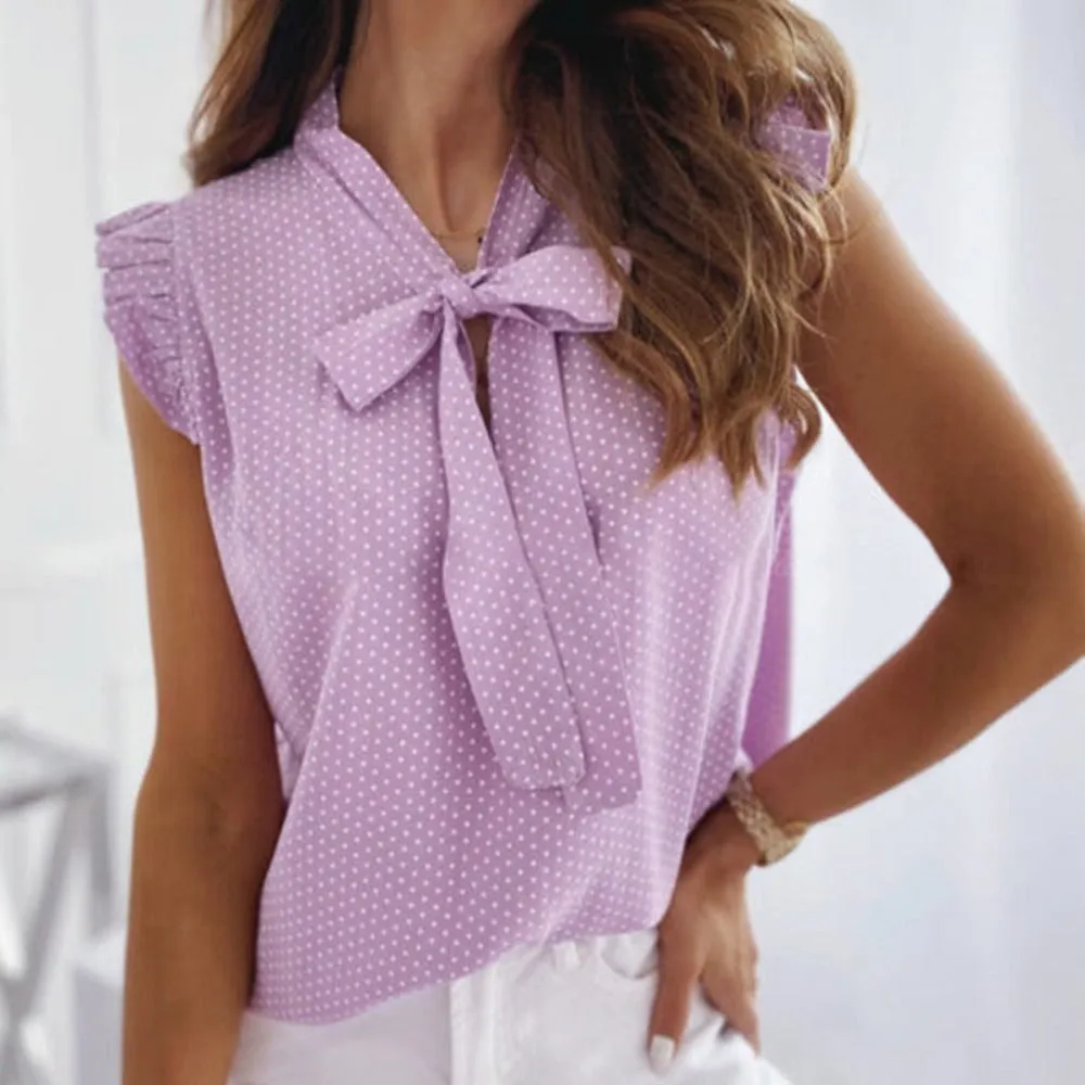 Elegant Ruffles Sleeveless Polka Dot Blouse sold by Body Central