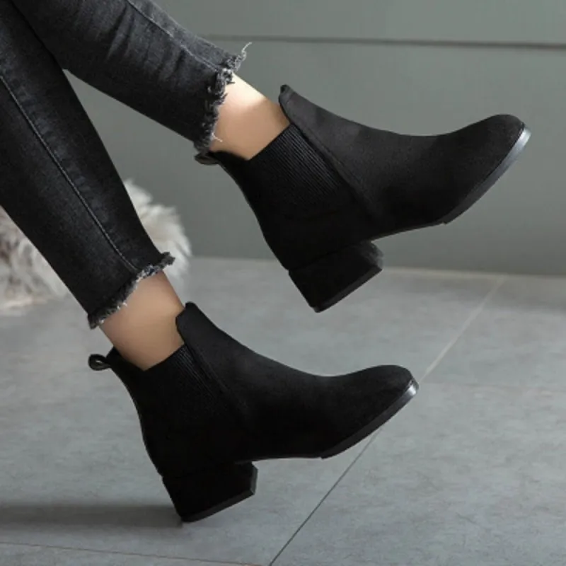 Thick Heel Slip On Round Toe Ankle Boots sold by Body Central