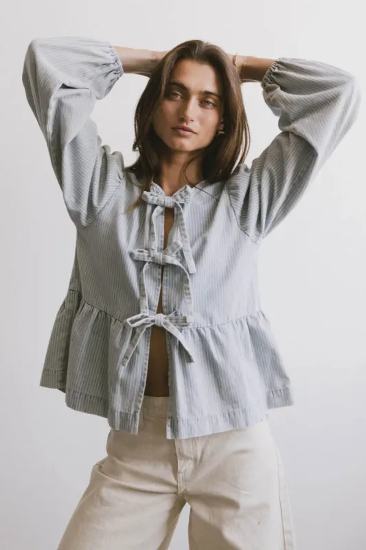 Maggie Peplum Tie Blouse in Light Wash sold by bohme