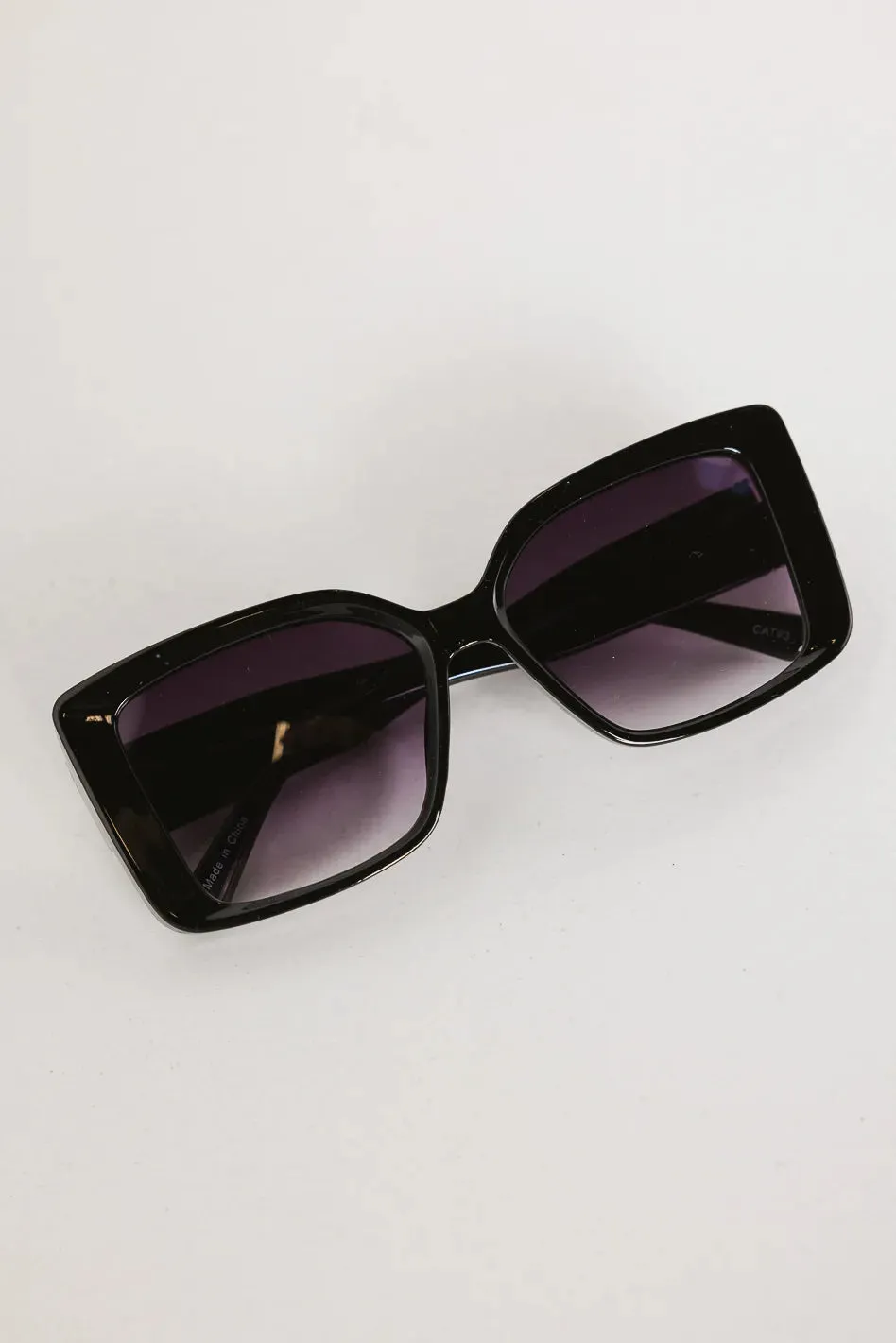 Thalia Sunglasses in Black sold by bohme