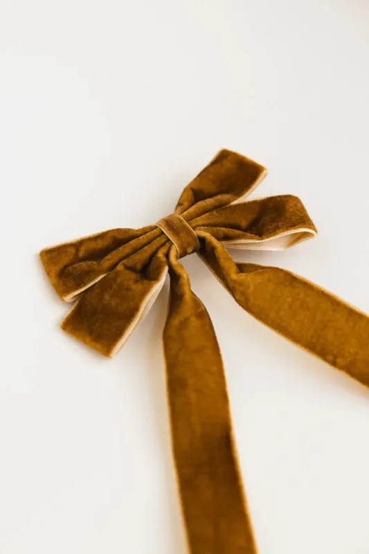 Velvet Bow Hair Clip in Brown sold by bohme