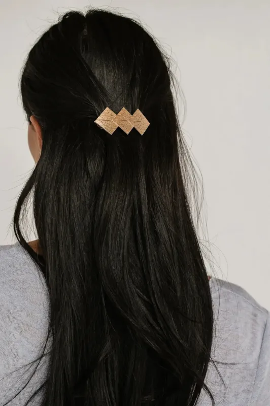 Geometric Hair Clip in Gold sold by bohme
