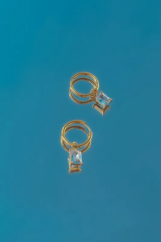 Kyla Charm Hoop Earrings sold by bohme