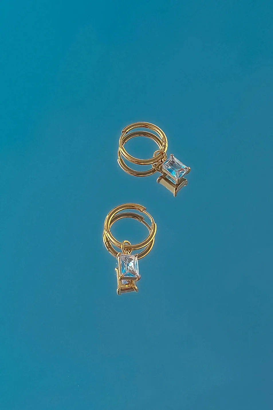 Kyla Charm Hoop Earrings sold by bohme