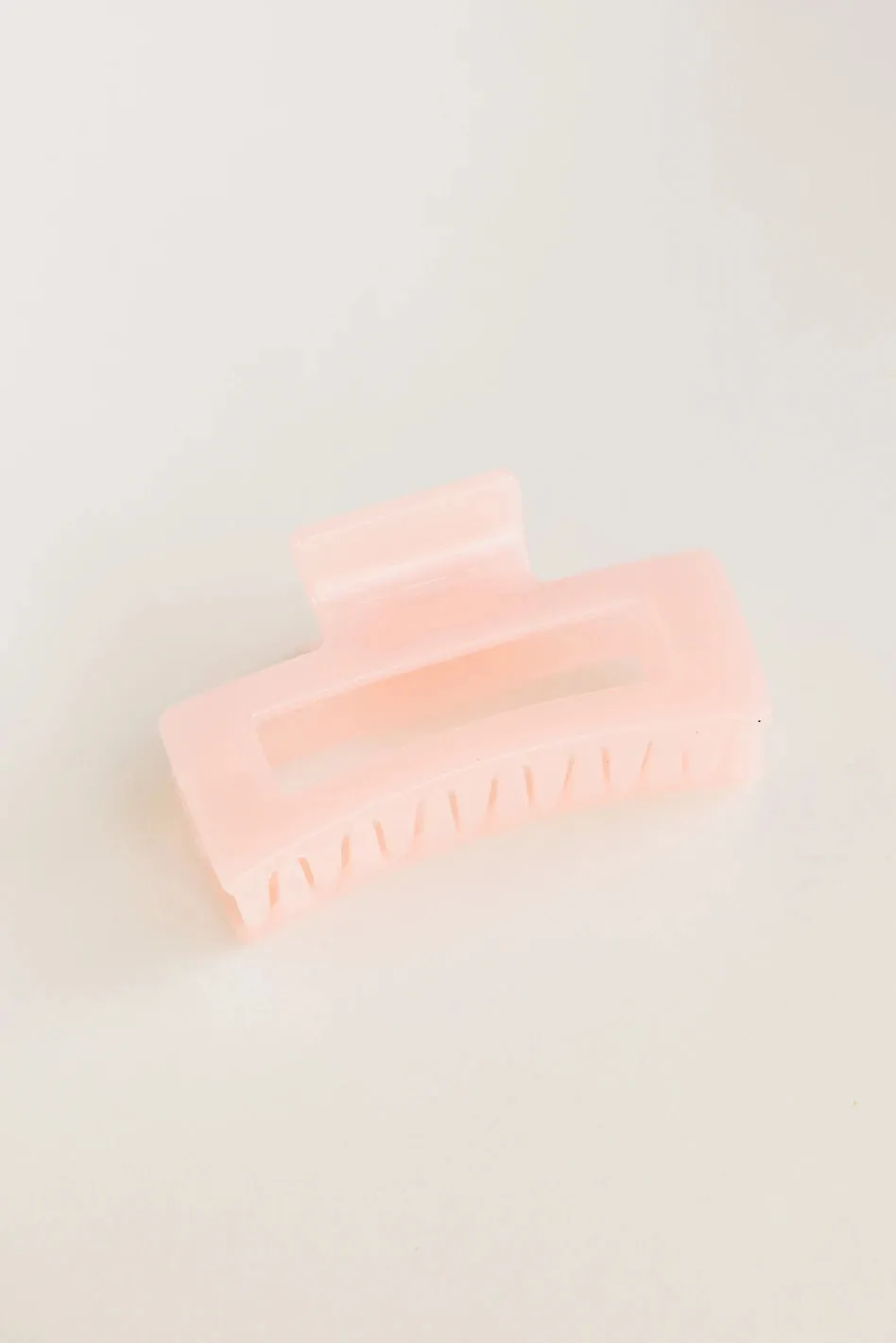 Translucent Rectangle Claw Clip in Pink sold by bohme