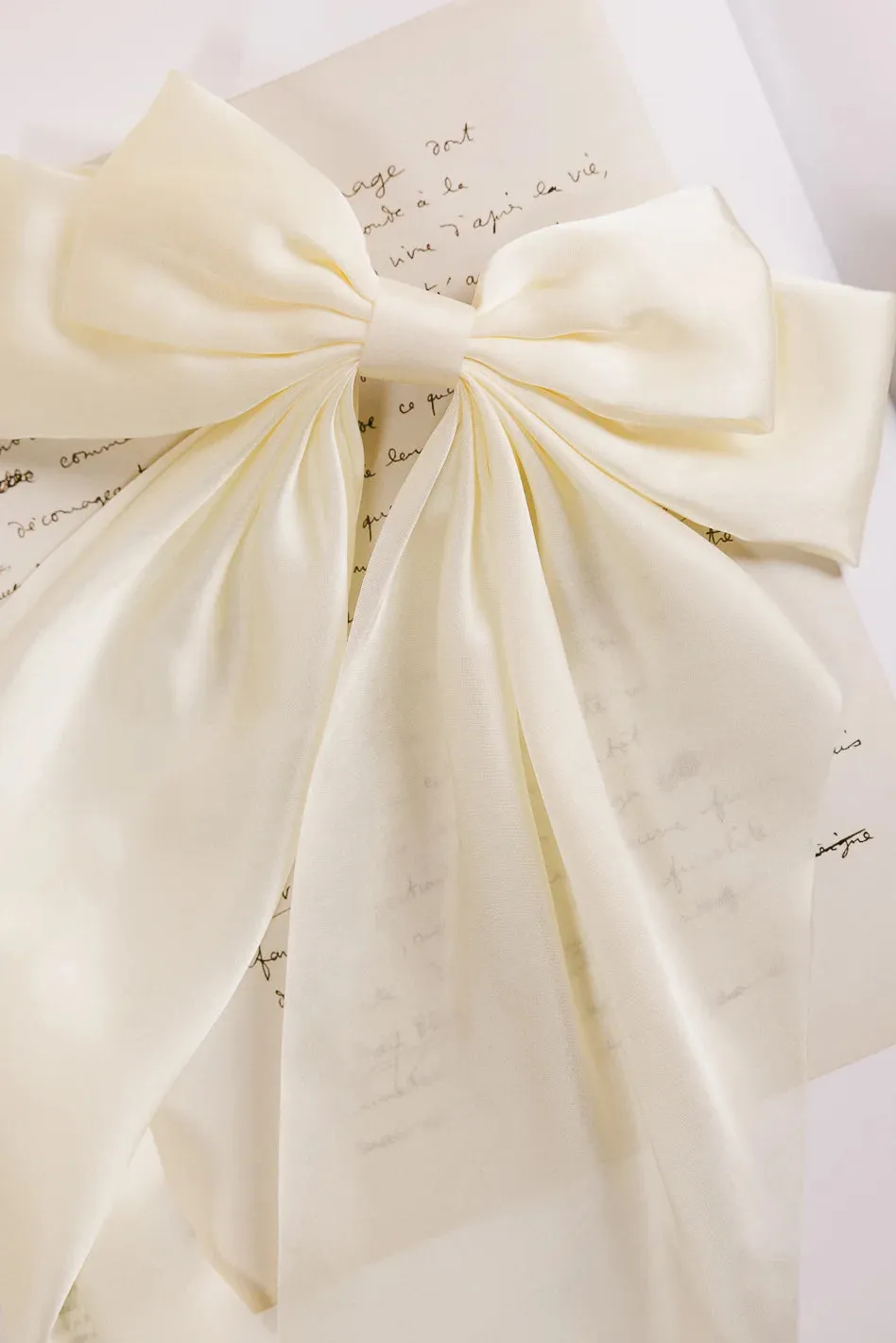Oversized Bow Hair Clip in White sold by bohme