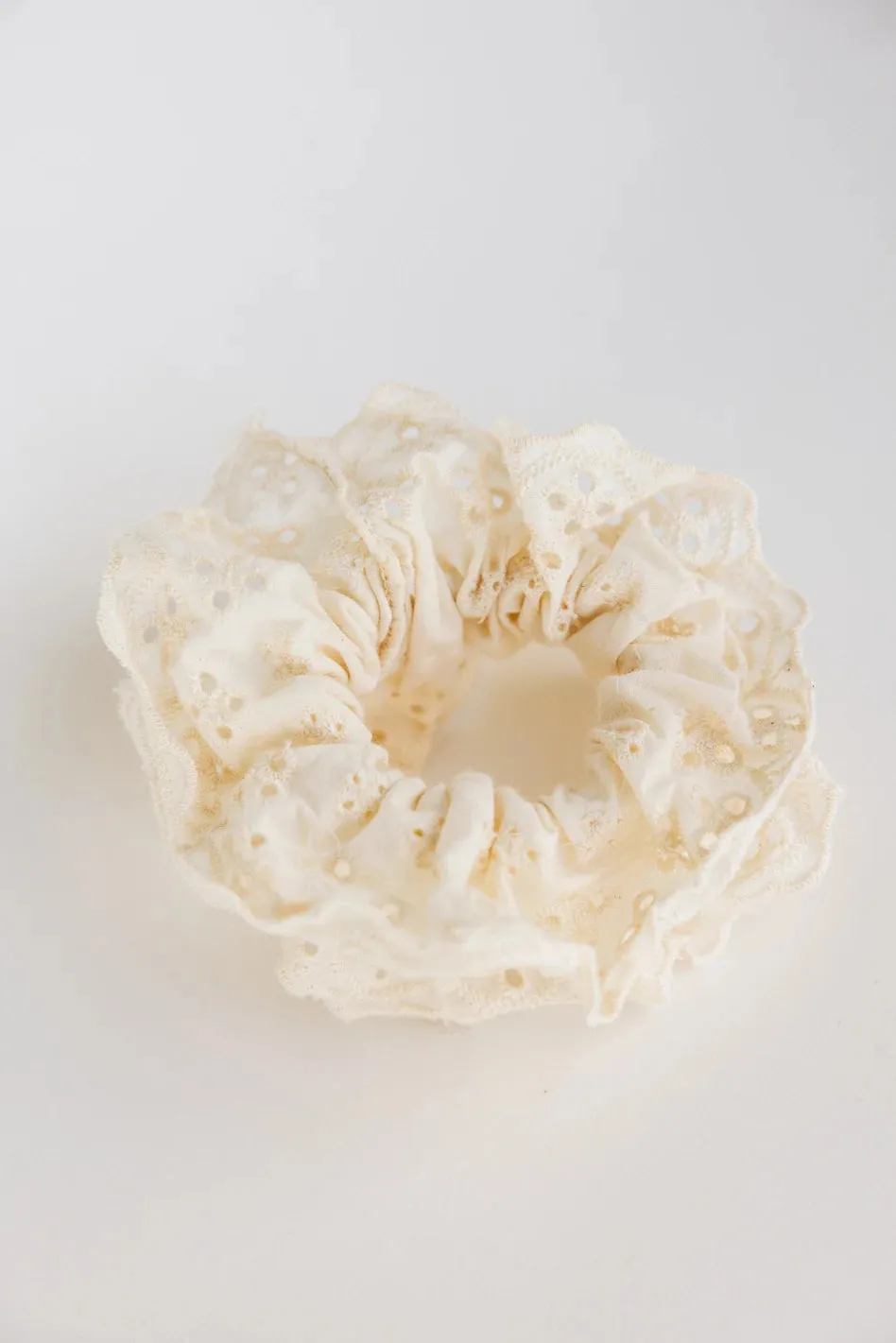 Floral Lace Scrunchie in Cream sold by bohme
