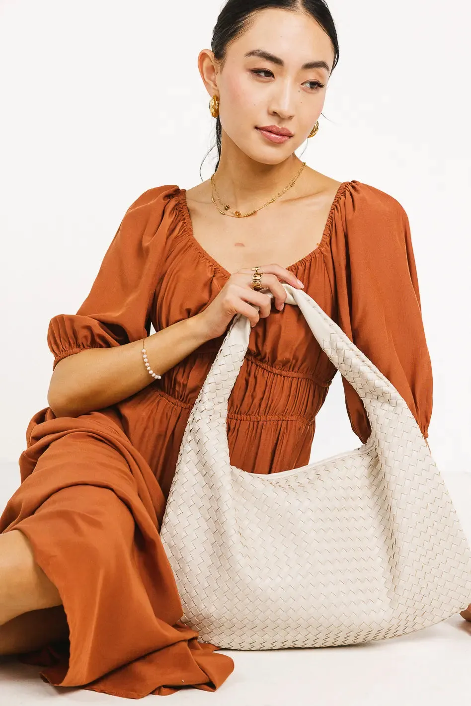 Cercee Hobo Bag in Cream sold by bohme