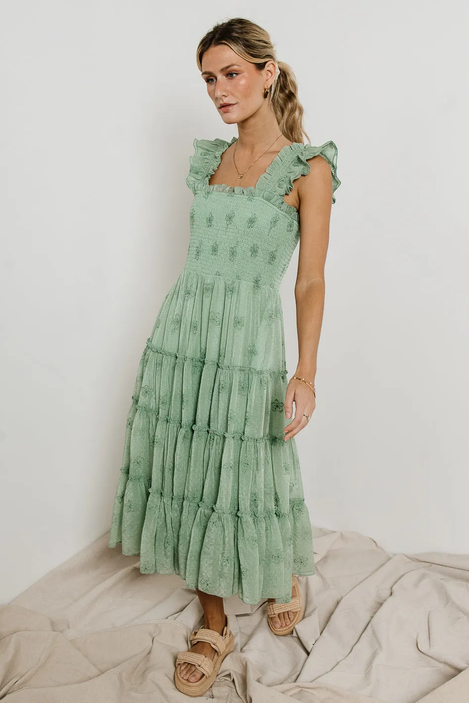Floral Embroidered Smocked Dress in Green sold by bohme