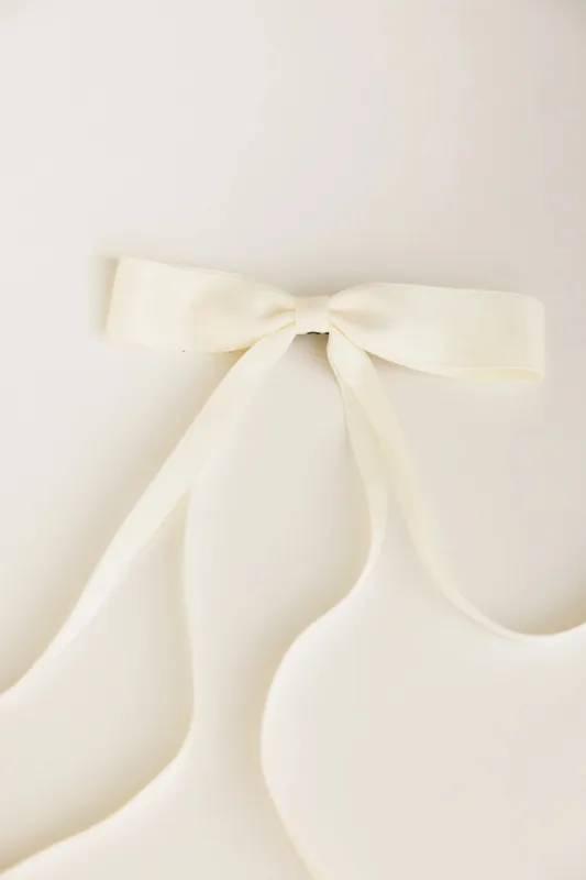 Bow Hair Clip in Cream sold by bohme