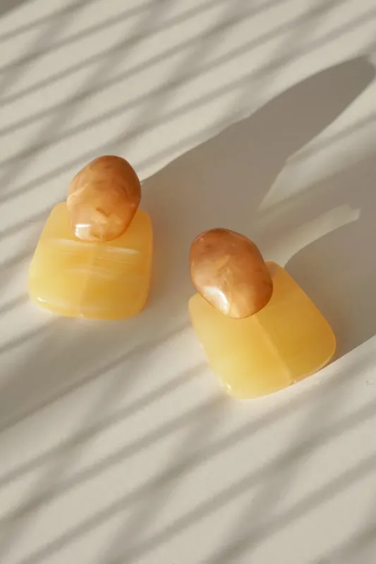 Ariana Earrings in Sand sold by bohme