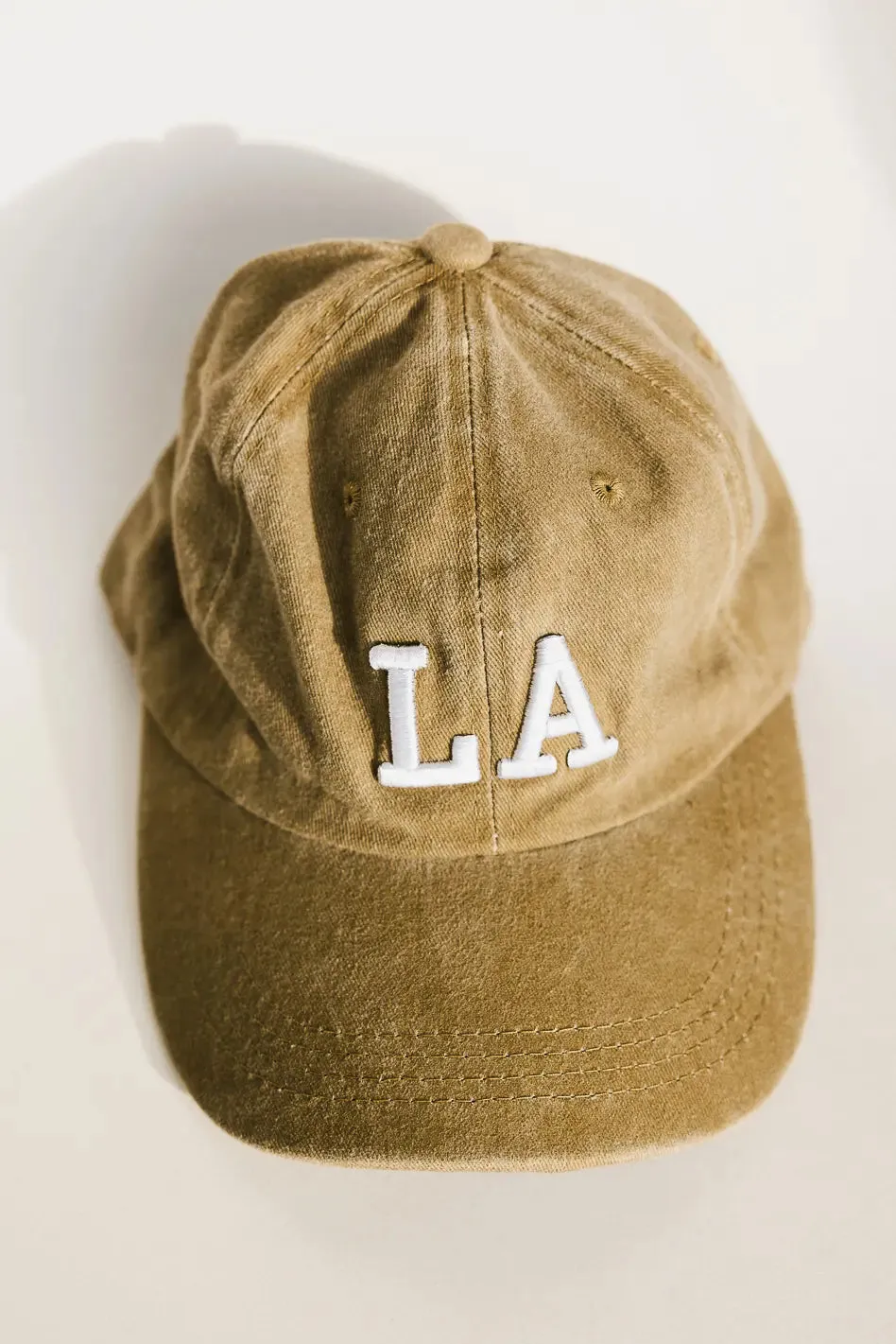 LA Baseball Cap in Khaki sold by bohme