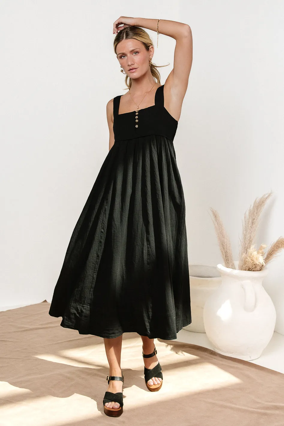 Chloe Midi Dress in Black sold by bohme
