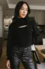Cut Out Turtleneck Sweater in Black - FINAL SALE sold by bohme