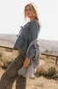 Maggie Peplum Tie Blouse in Medium Wash sold by bohme