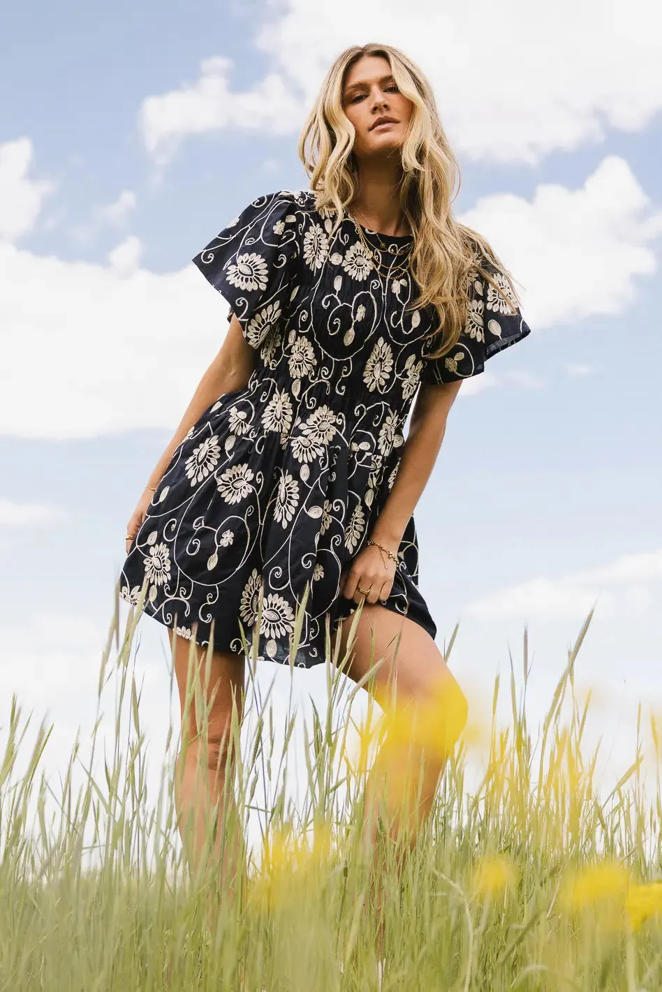 Priya Embroidered Mini Dress in Navy sold by bohme