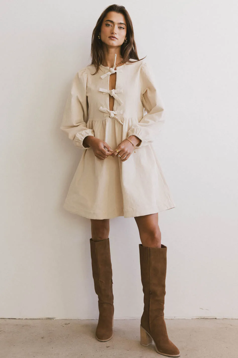 Tyler Peplum Mini Dress in Ivory Corduroy sold by bohme