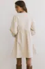 Tyler Peplum Mini Dress in Ivory Corduroy sold by bohme