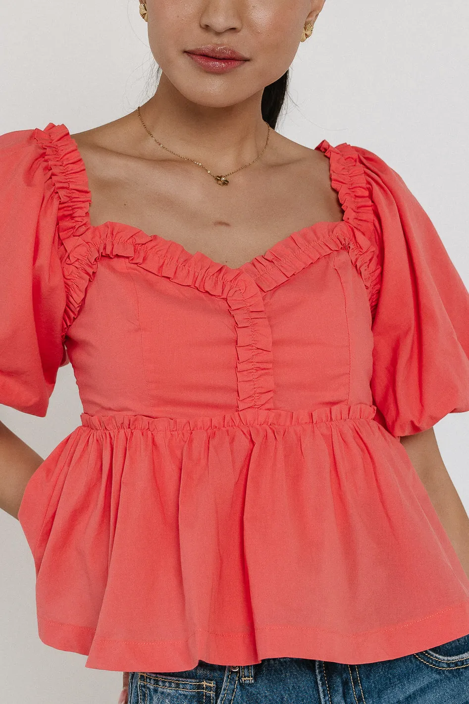 Ruffle Peplum Top in Coral - FINAL SALE sold by bohme