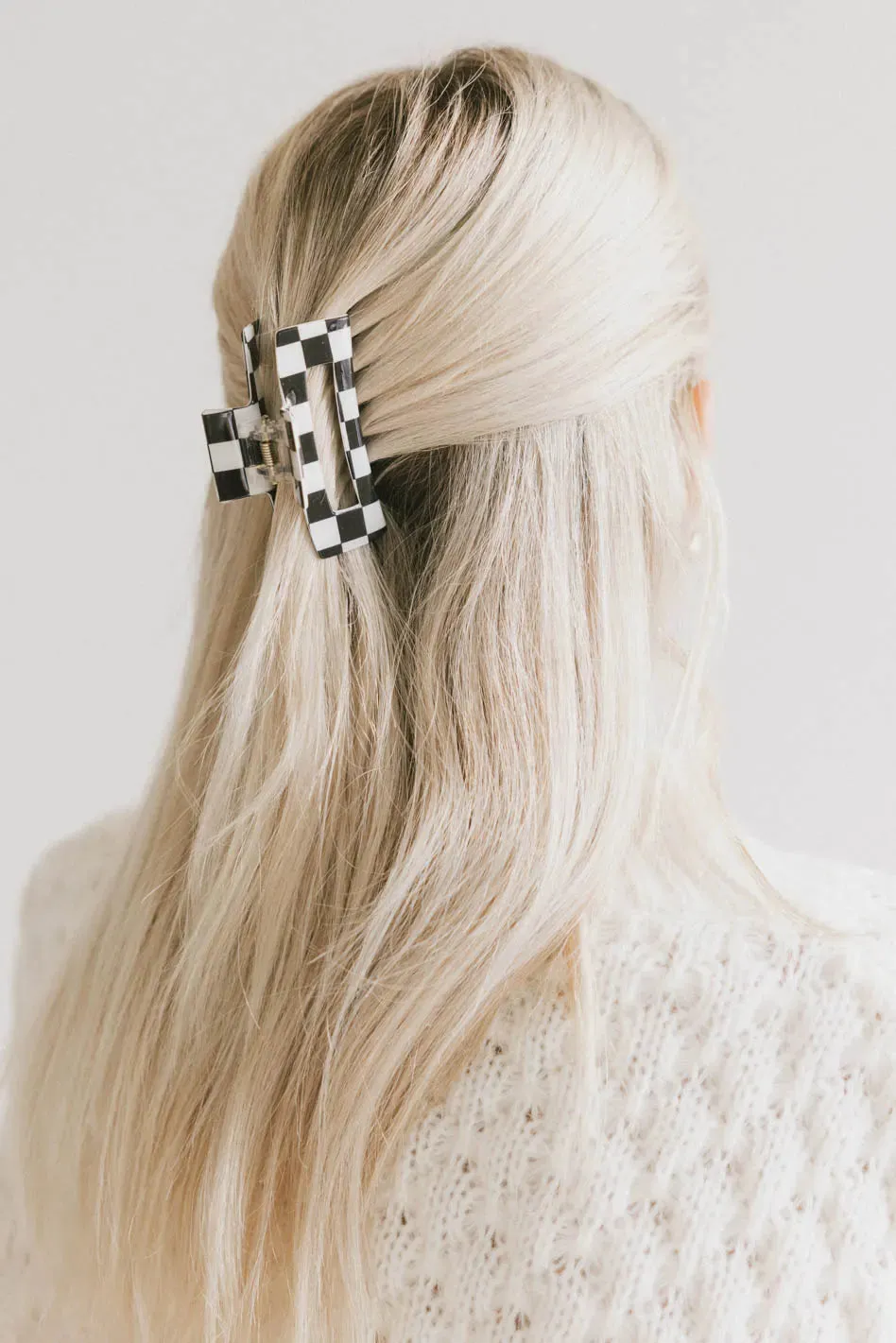 Medium Cutout Claw Clip in Black Checker sold by bohme
