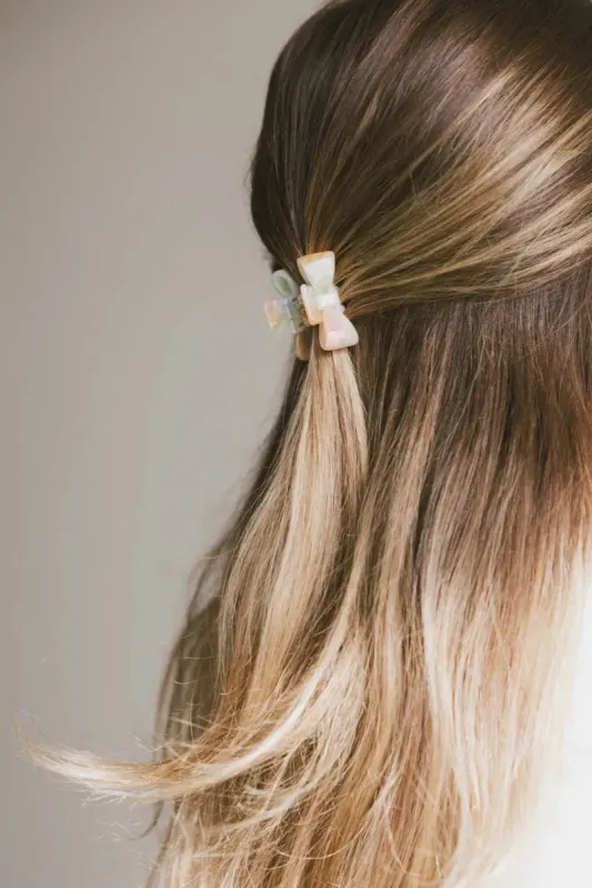 Mini Bow Claw Clip in Multi sold by bohme