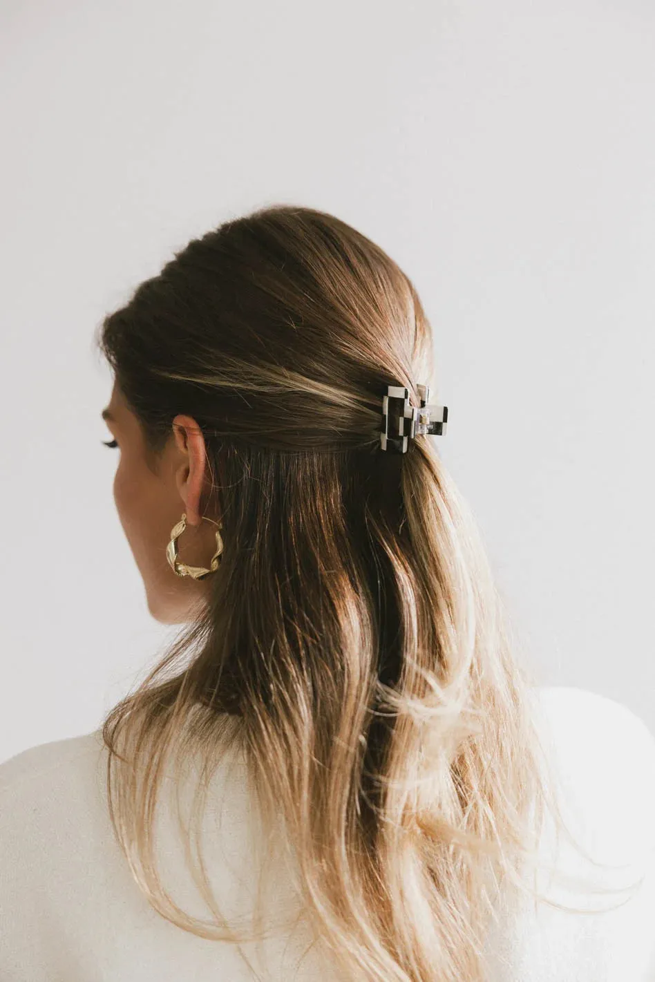 Mini Cutout Claw Clip in Black Checkered sold by bohme