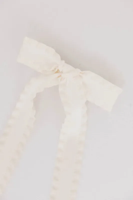 Long Tail Bow Hair Clip in Ivory sold by bohme