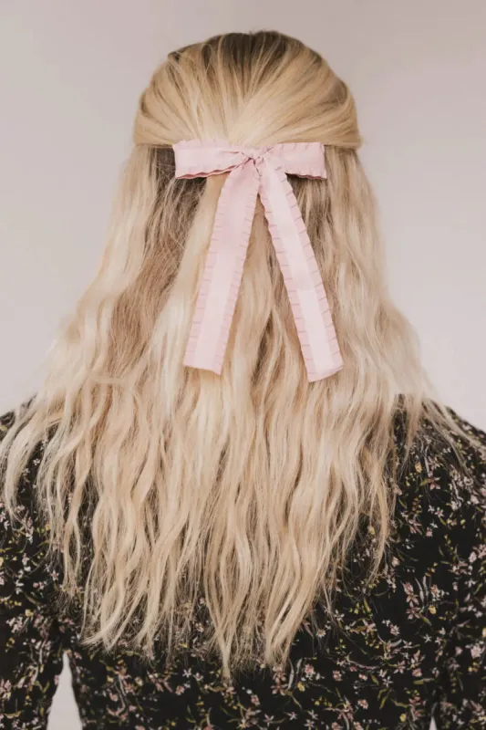 Long Tail Bow Hair Clip in Pink sold by bohme