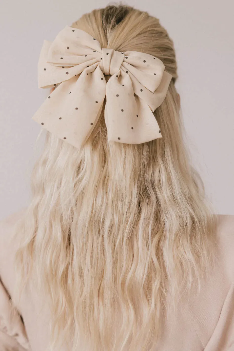 Polka Dot Bow Hair Clip in Ivory sold by bohme