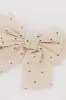 Polka Dot Bow Hair Clip in Ivory sold by bohme