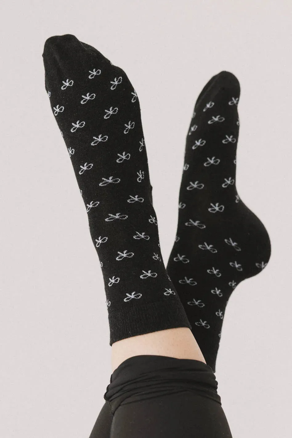 Bow Socks in Black sold by bohme