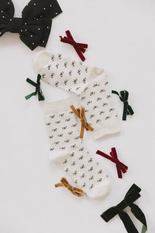 Mini Velvet Bow Clip in Green sold by bohme