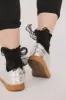 Ruffle Bow Socks in Black sold by bohme