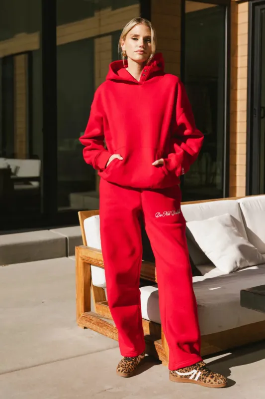 Do Not Disturb Sweatpants in Red sold by bohme