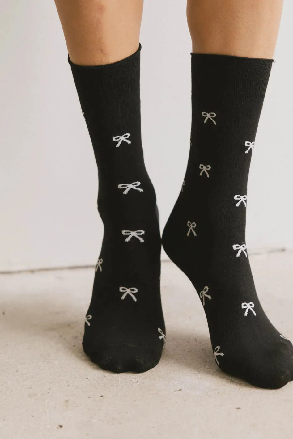 Clarissa Bow Socks in Black sold by bohme